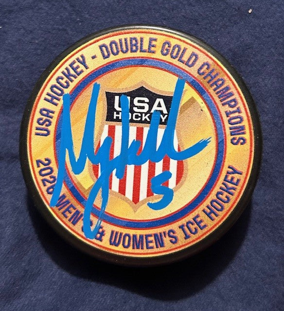 Megan Keller signed Double Gold Puck