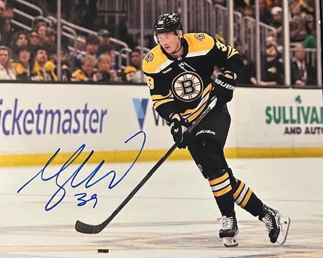 Morgan Geekie signed Bruins photo with puck