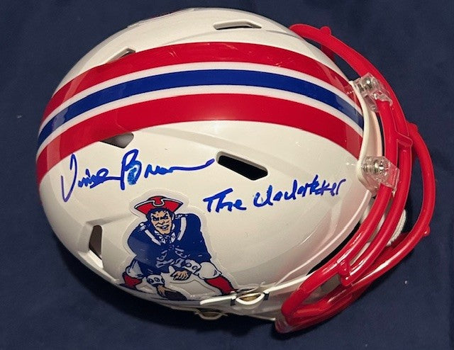 Vincent Brown signed mini helmet with The Undertaker